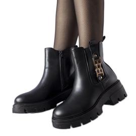 Botines macizos negros con hebilla decorativa Nuovo