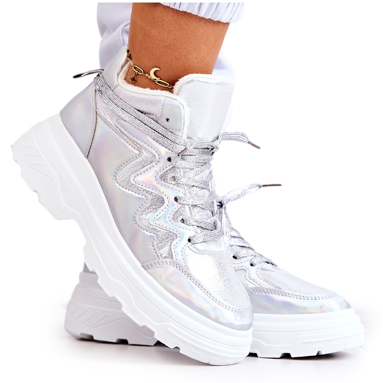 Zapatos deportivos aislados de plata de mujer