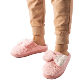 Pantuflas calentitas rosas con lazo. rosado