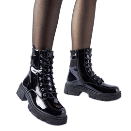 Botines Cunha de charol negro y ligeramente aislantes