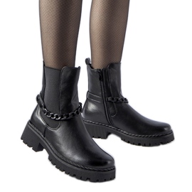 Botines negros aislantes con cadena Tiziano