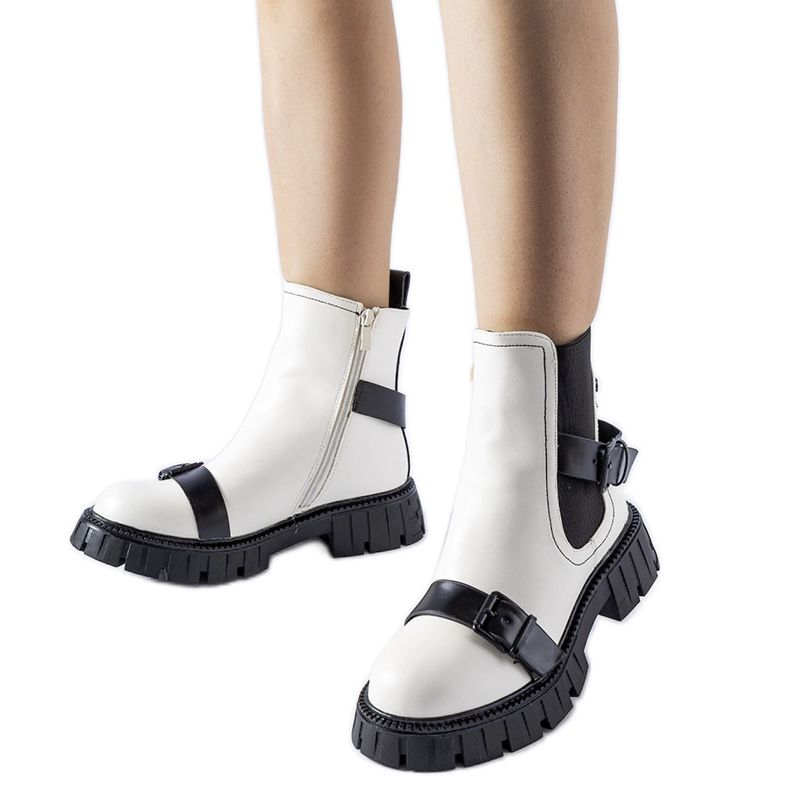 Botines blancos con suela masiva Fontarine.