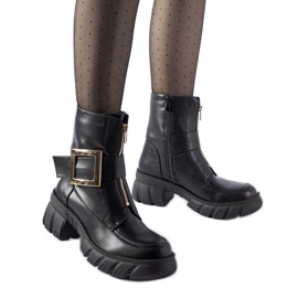Botines negros masivos con hebilla Morgan