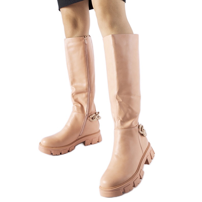 Botas planas rosas con cadena de Armand rosado