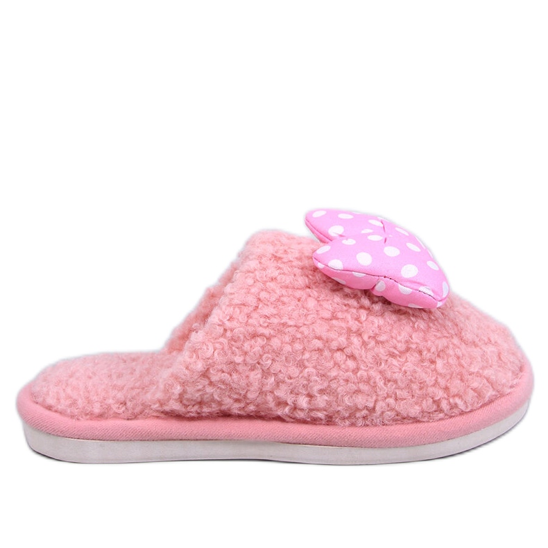 Zapatillas infantiles infantiles rosa con lazo. rosado