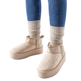 Botas de nieve beige con plataforma Dennison.