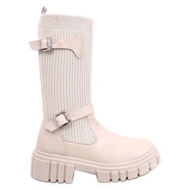Botas Rhea Beige con parte superior flexible.