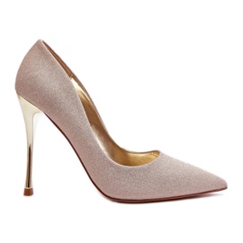 Tacones altos con purpurina dorada de Tiberon dorado