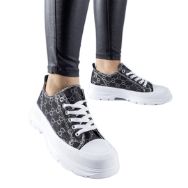 Zapatillas negras decoradas con el monograma de Antonella. negro