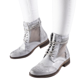 Botas planas plateadas caladas de Reeves plata