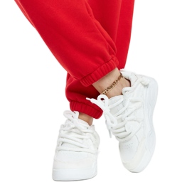 Zapatillas blancas con inserciones de tejido Melilot. blanco