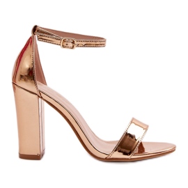 Sandalias de tacón alto Thakko en oro rosa dorado