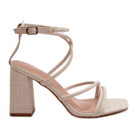 Sandalias Herfiana nude de tacón y tiras beige
