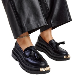 Mocasines macizos negros con inserciones doradas Tuga