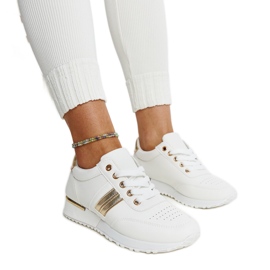 Zapatillas blancas y doradas con plataforma de goma Nihad. blanco
