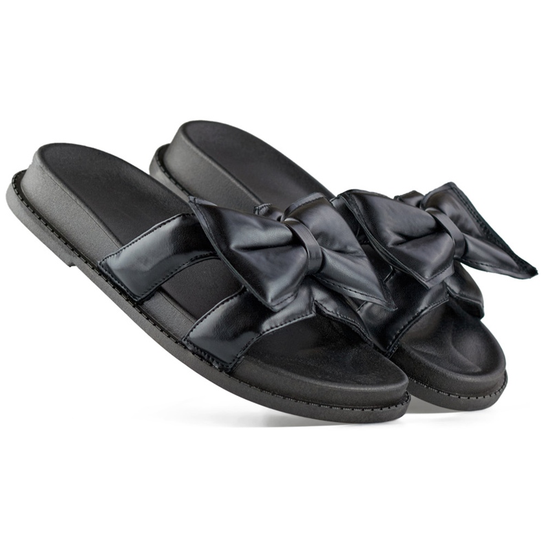 Pantuflas de mujer negras con lazo confeccionadas en ecopiel. negro Pantuflas de mujer negras con lazo confeccionadas en ecopiel. negro