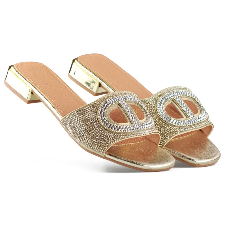 Pantuflas de mujer elegantes con tacón bajo y lentejuelas doradas. dorado