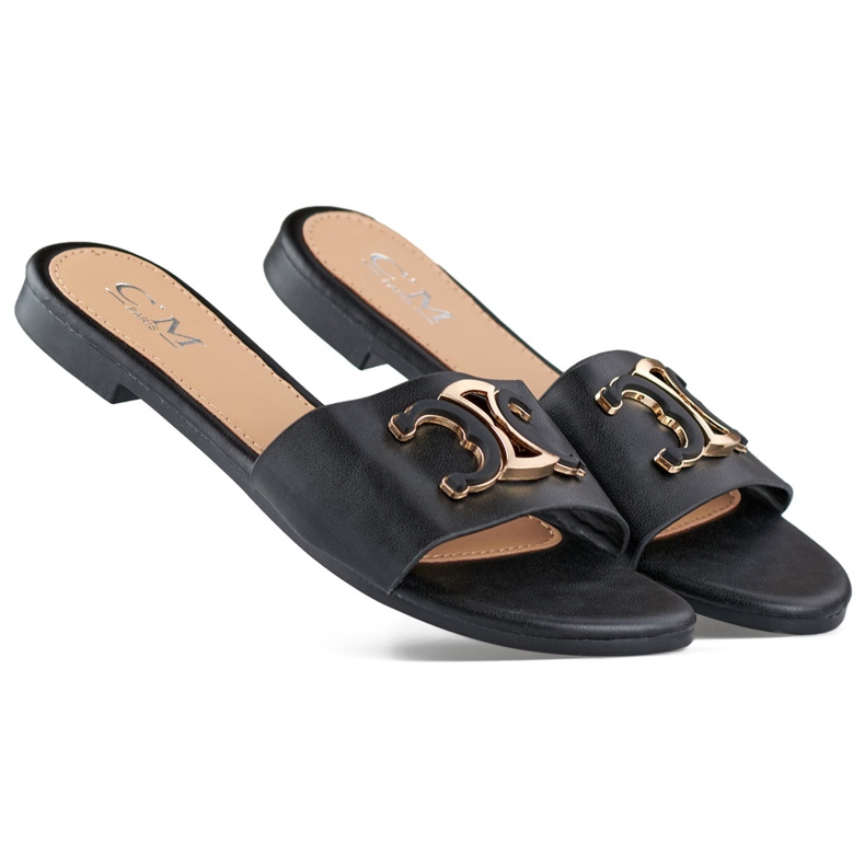 Chanclas de mujer elegantes negras con decoración. negro