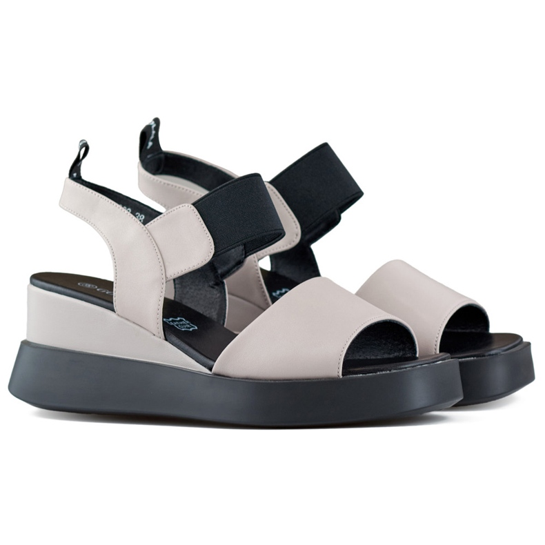 Sandalias de mujer de piel con cuña y elástico beige Sandalias de mujer de piel con cuña y elástico beige