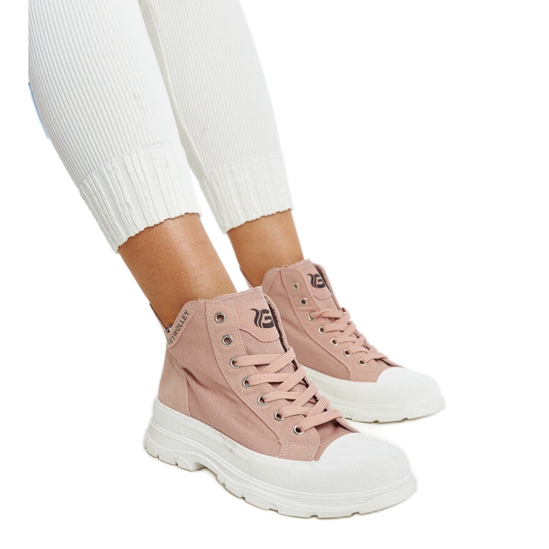 Zapatillas altas rosas con muescas de Nura rosado