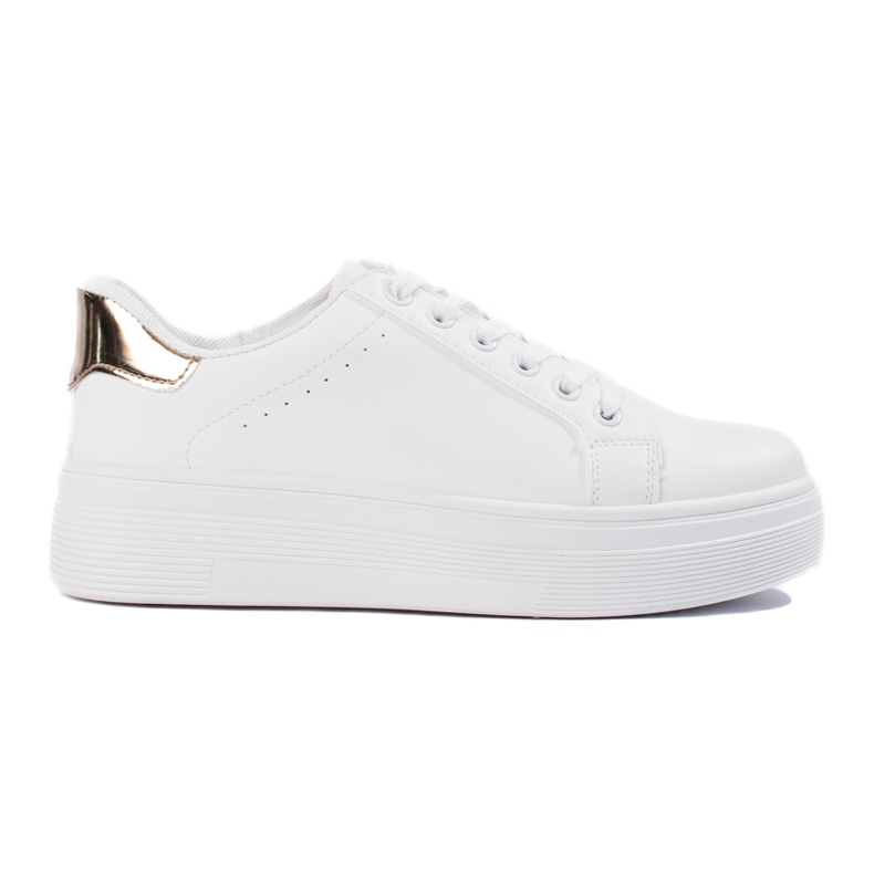 Zapatillas deportivas blancas de mujer. blanco