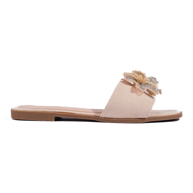 Chanclas de mujer beige con decoración.