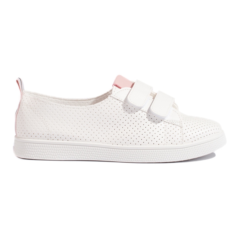 Zapatillas blancas de mujer con velcro. blanco