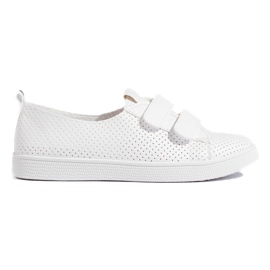 Zapatillas blancas de mujer con velcro. blanco