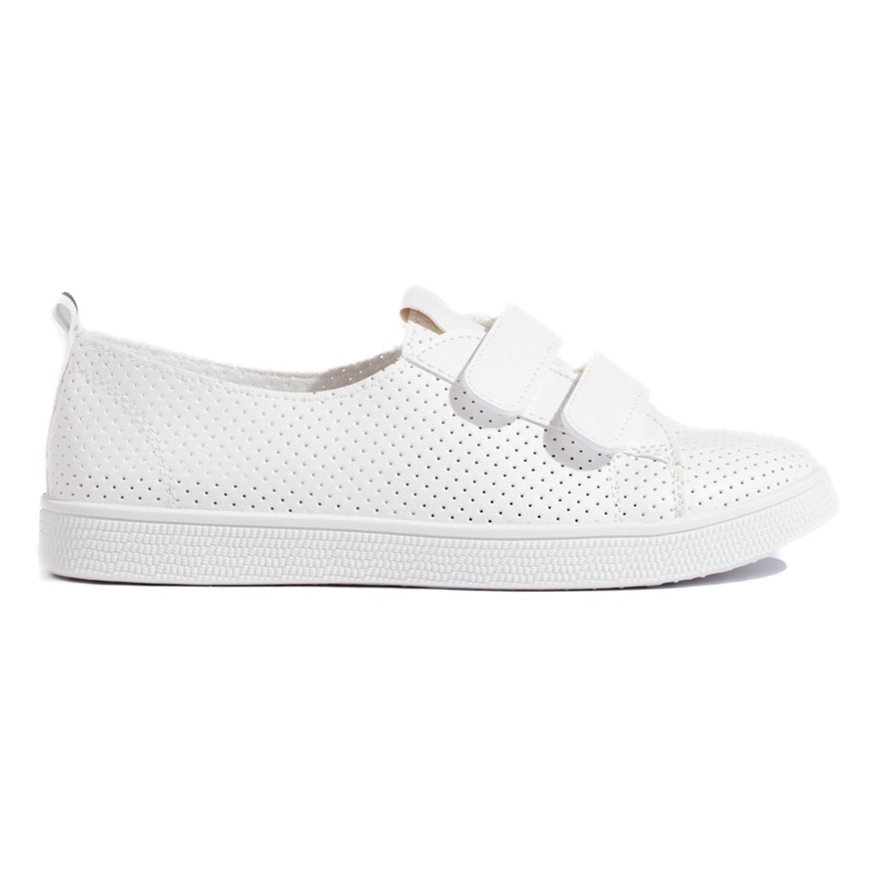 Zapatillas blancas de mujer con velcro. blanco