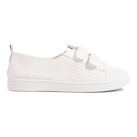 Zapatillas blancas de mujer con velcro. blanco