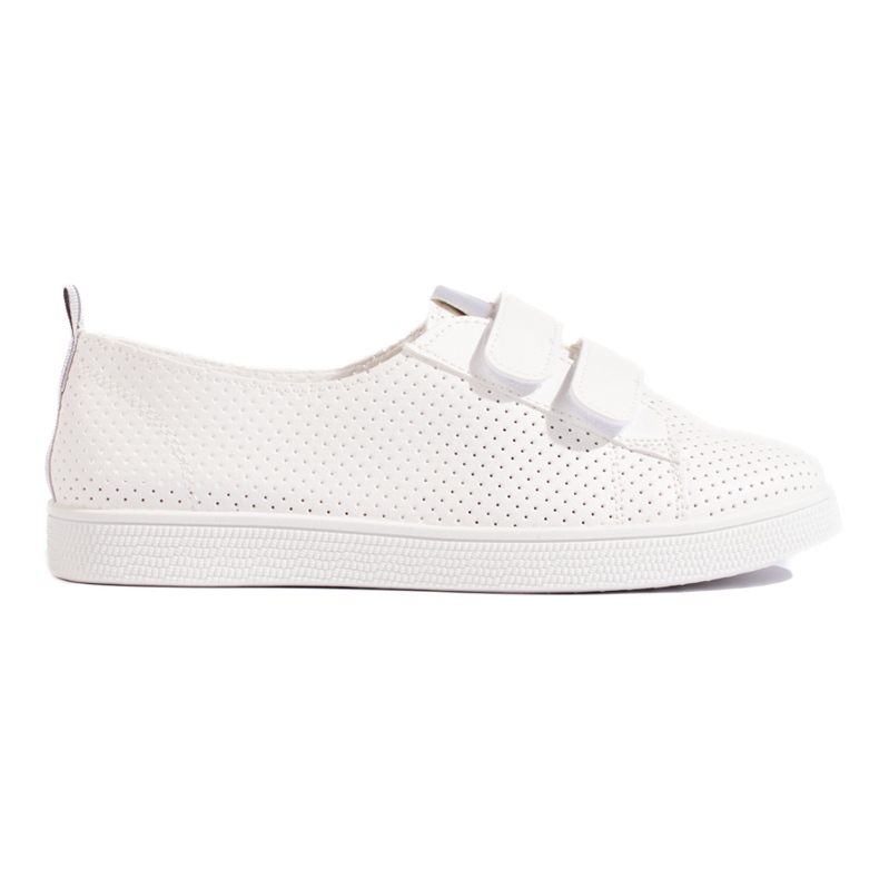Zapatillas blancas de mujer con velcro. blanco