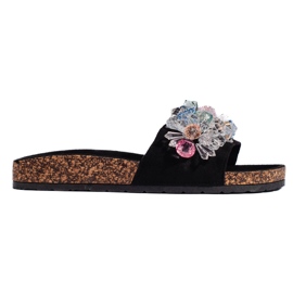 Pantuflas mujer ante negro