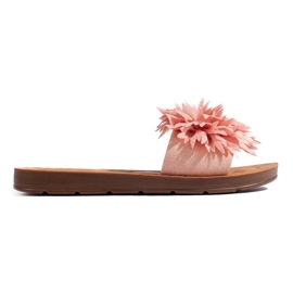 Chanclas de mujer rosa con flor. rosado