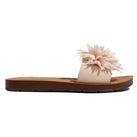 Chanclas de mujer beige con flor.