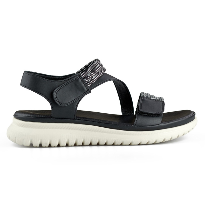 Sandalias cómodas de mujer en color negro con banda elástica y cierre de velcro.