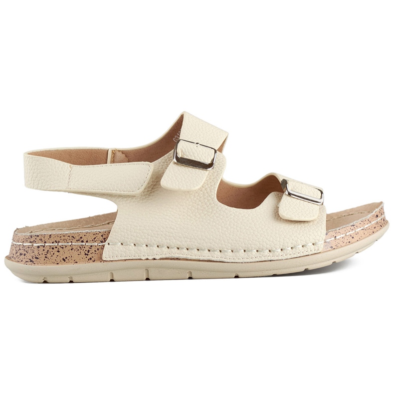 Sandalias cómodas de mujer beige con cierre de velcro.