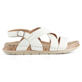 Sandalias de mujer blancas con plantilla de piel. blanco