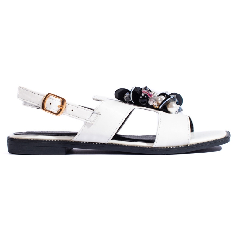 Sandalias de mujer blancas con adorno. blanco