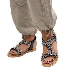 Las brillantes sandalias negras de Shahida negro