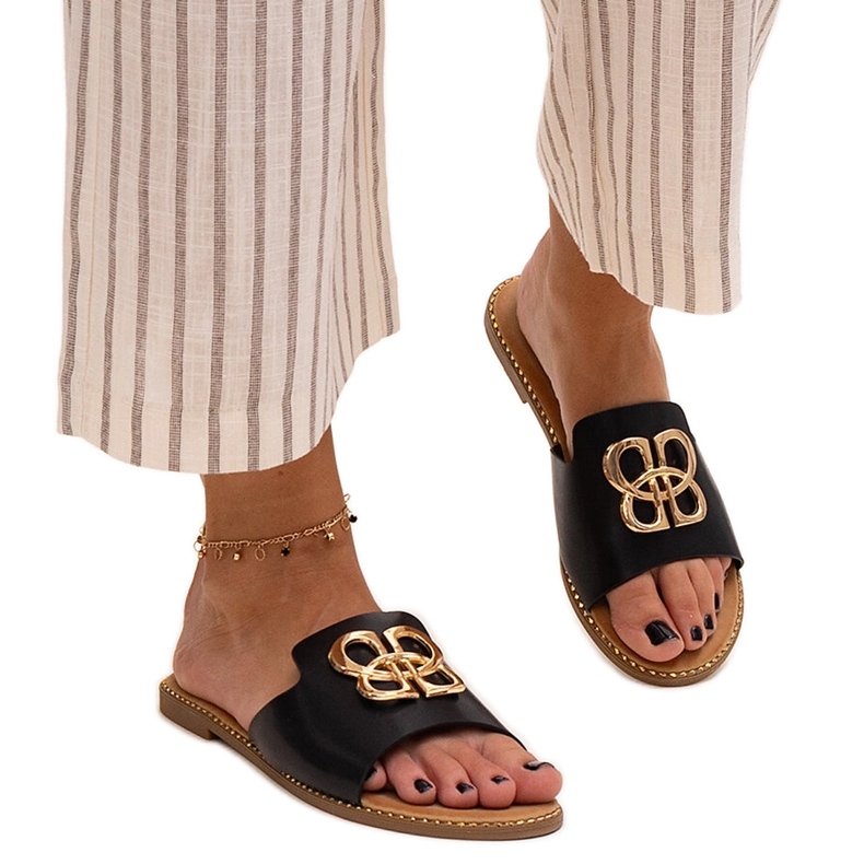 Chanclas negras decoradas con una hebilla Perkin negro