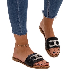 Chanclas negras con hebilla decorativa de Rochaela negro
