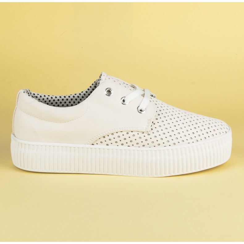Kylie Zapatillas caladas en la plataforma. blanco