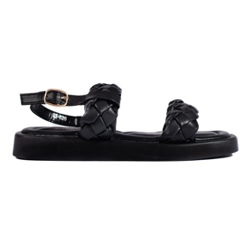 Sandalias de mujer negras con tiras trenzadas. negro