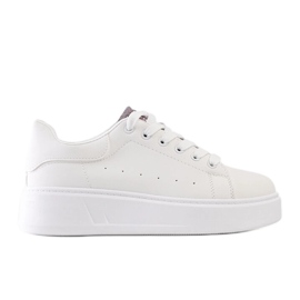 Zapatillas blancas con llamativo adorno Asmait. blanco