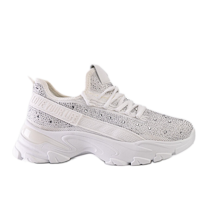 Zapatillas blancas brillantes con suela Senai masiva. blanco