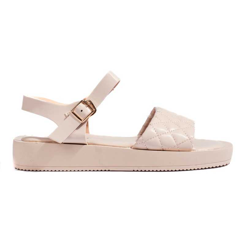 Sandalias de mujer beige con plataforma.