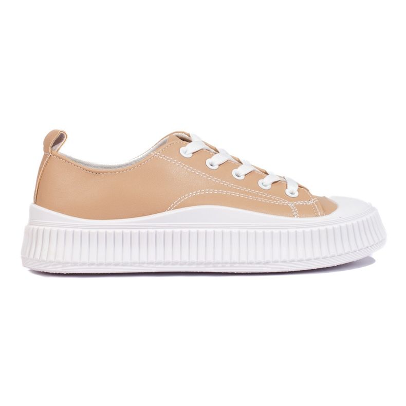 Zapatillas de mujer marrones fabricadas en piel ecológica. beige