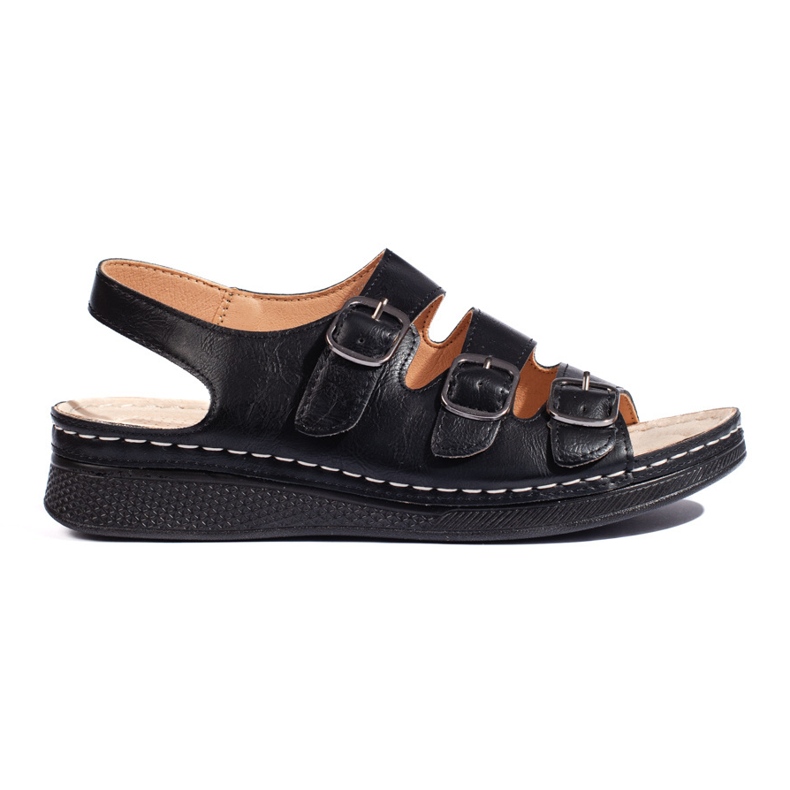 Sandalias de mujer negras con hebillas. negro