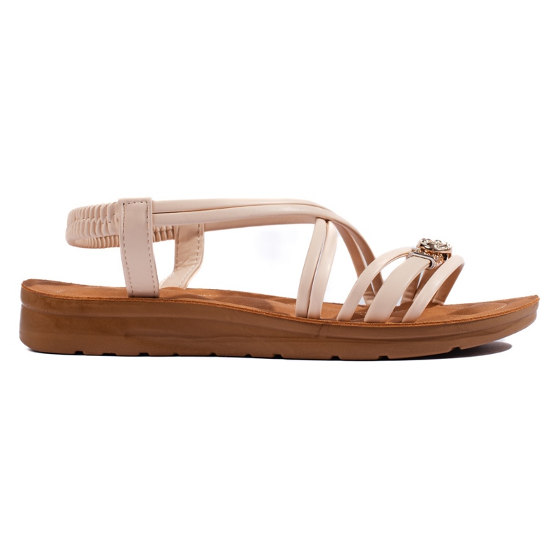 Sandalias planas beige con adorno