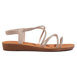 Sandalias slip-on beige con pedrería